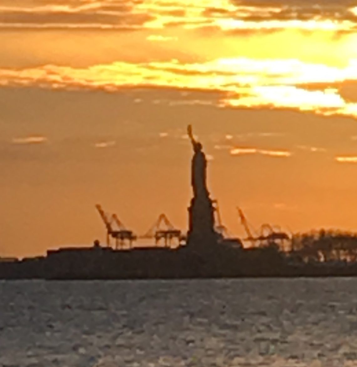 Statue of Liberty at sunset.