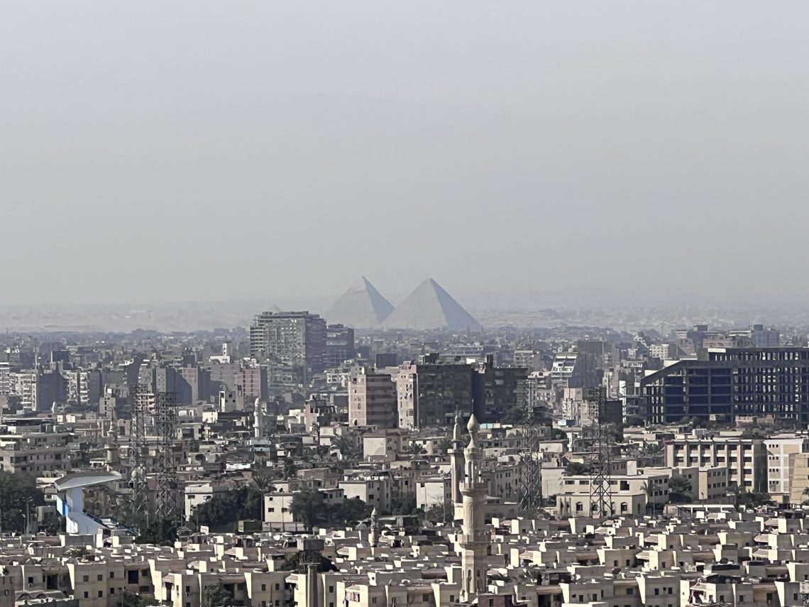 Cairo, Egypt with Pyramids of Giza in background